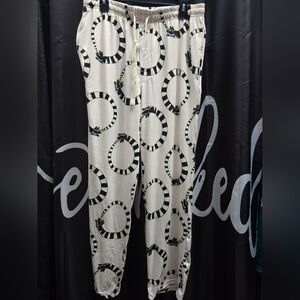 White Pants with Black and Green Snake Print